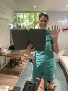 Lori Reid, Registered Dental Hygienist and founder of Pro Glow Teeth Whitening, in her boutique Toronto studio where she provides professional in-office teeth whitening in a comfortable, spa-like setting.
